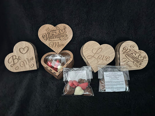 Wood heart shaped boxes with 1.9-2.0 oz. of chocolate. Personalize with a name at no additional charge.